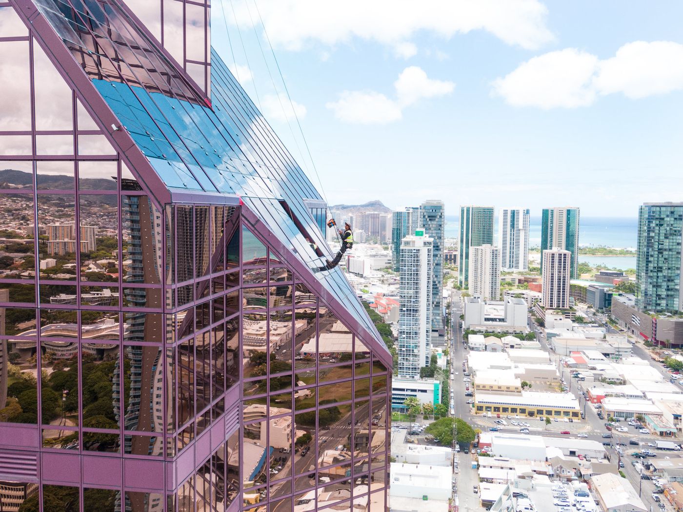 Aerial view of a glass tower facade