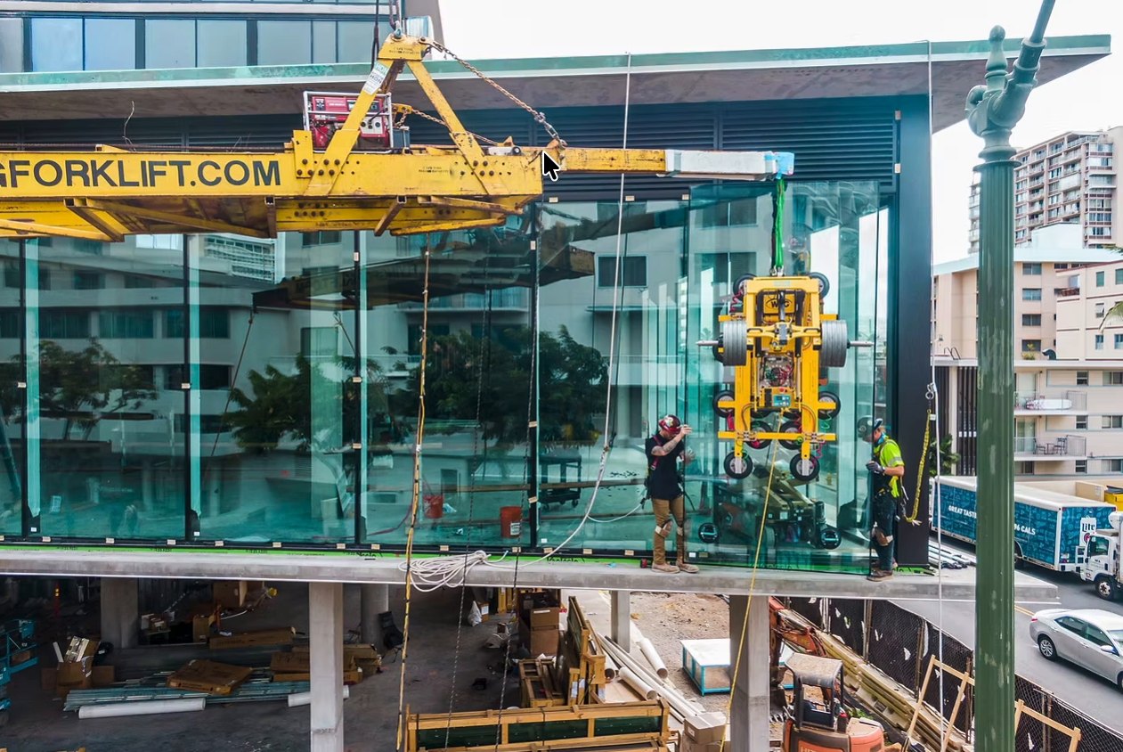 Flying Forklift lifting glass