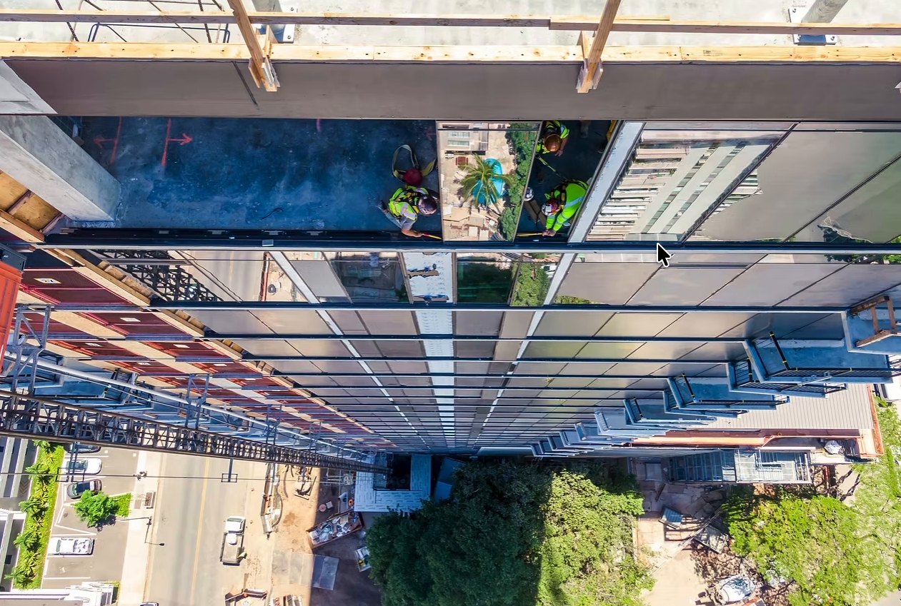 Glazing crew on the tower