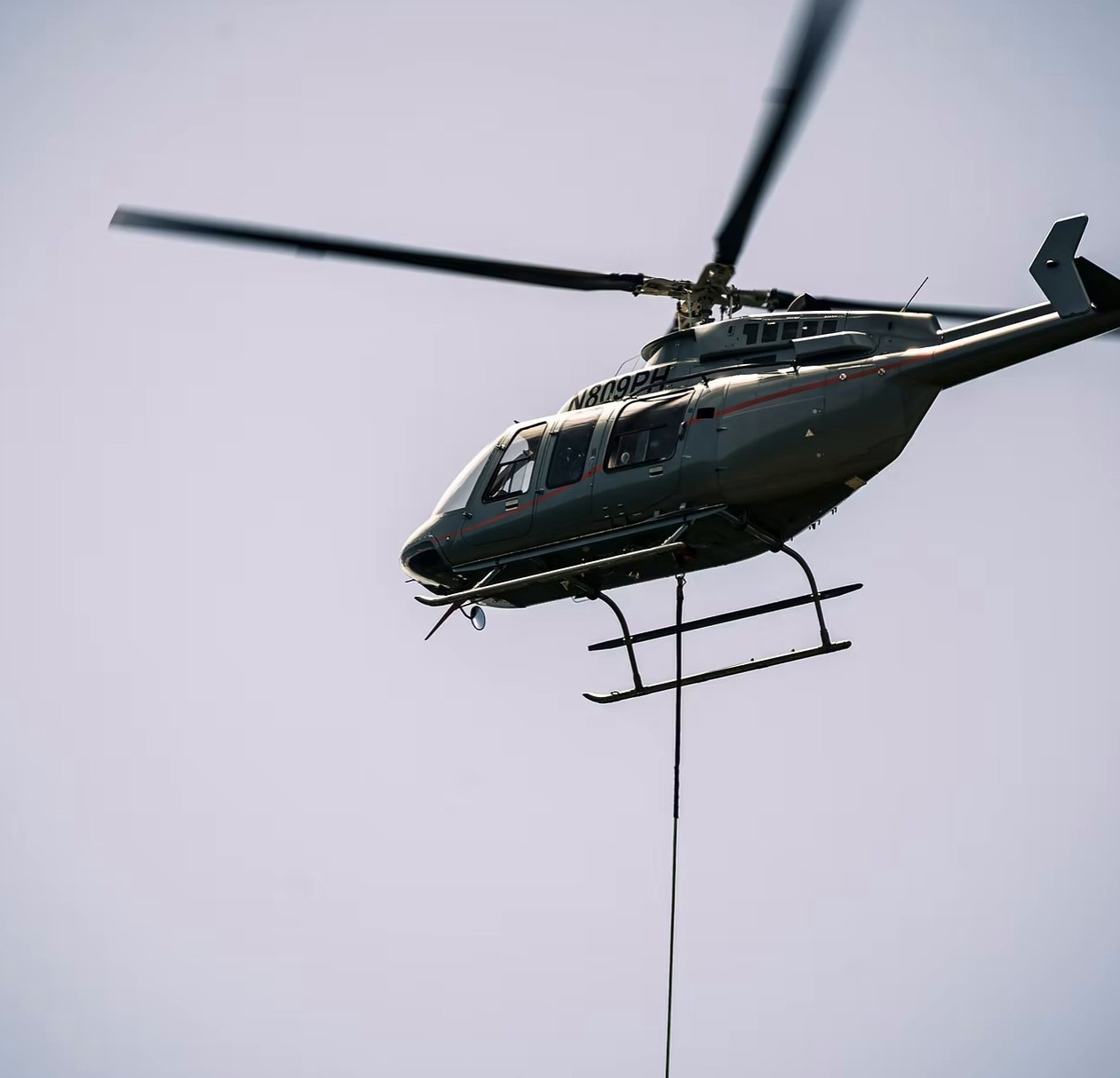 Helicopter flying a longline load