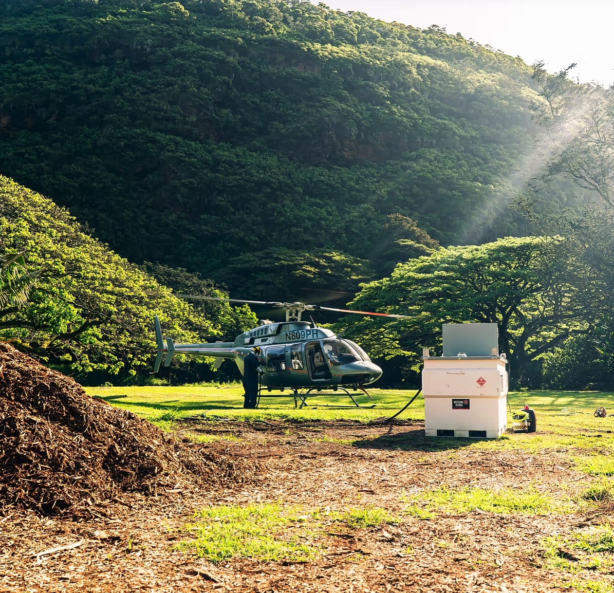 Helicopter staged on the lawn at sunrise
