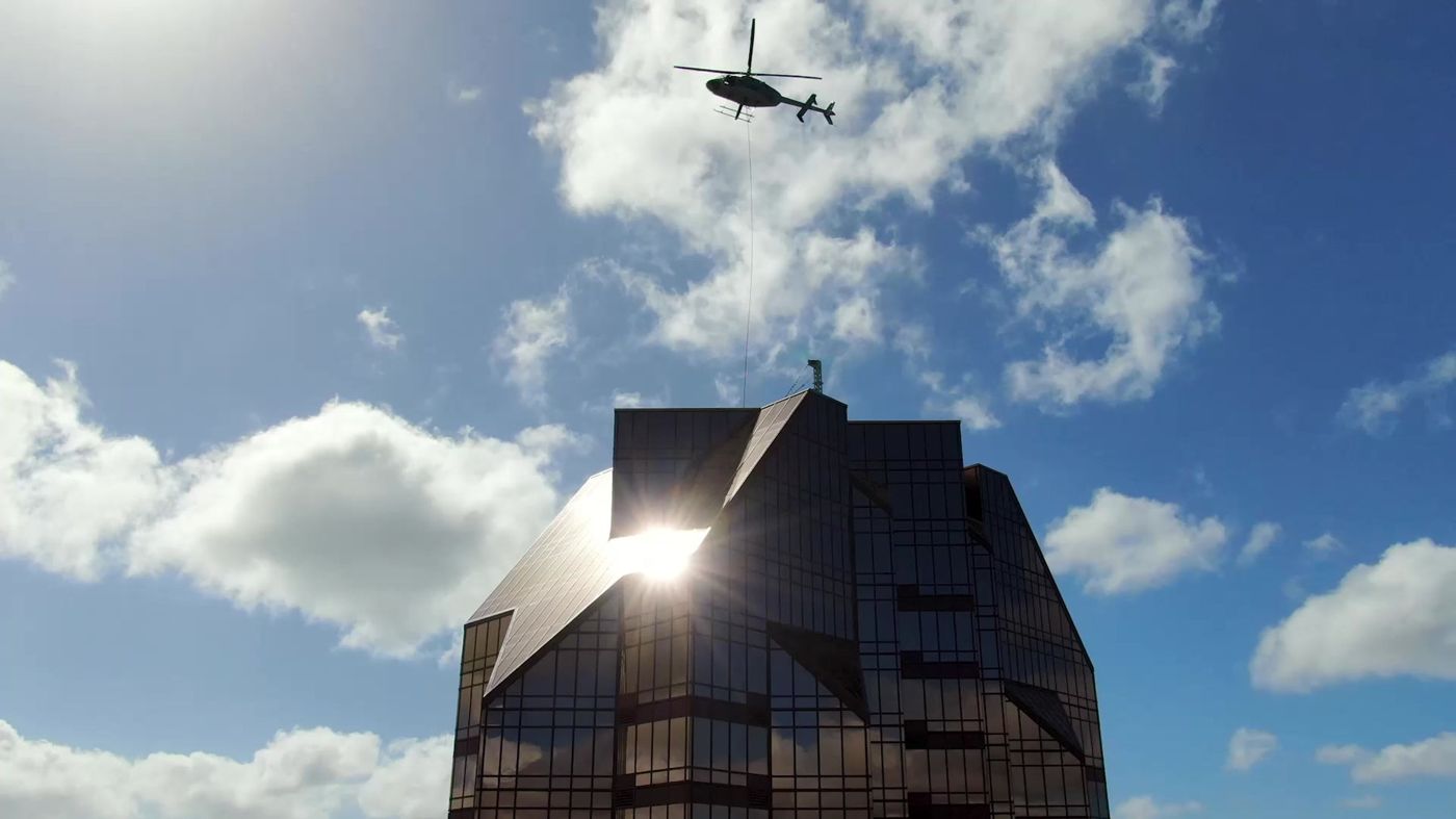 Honolulu high-rise with a helicopter overhead
