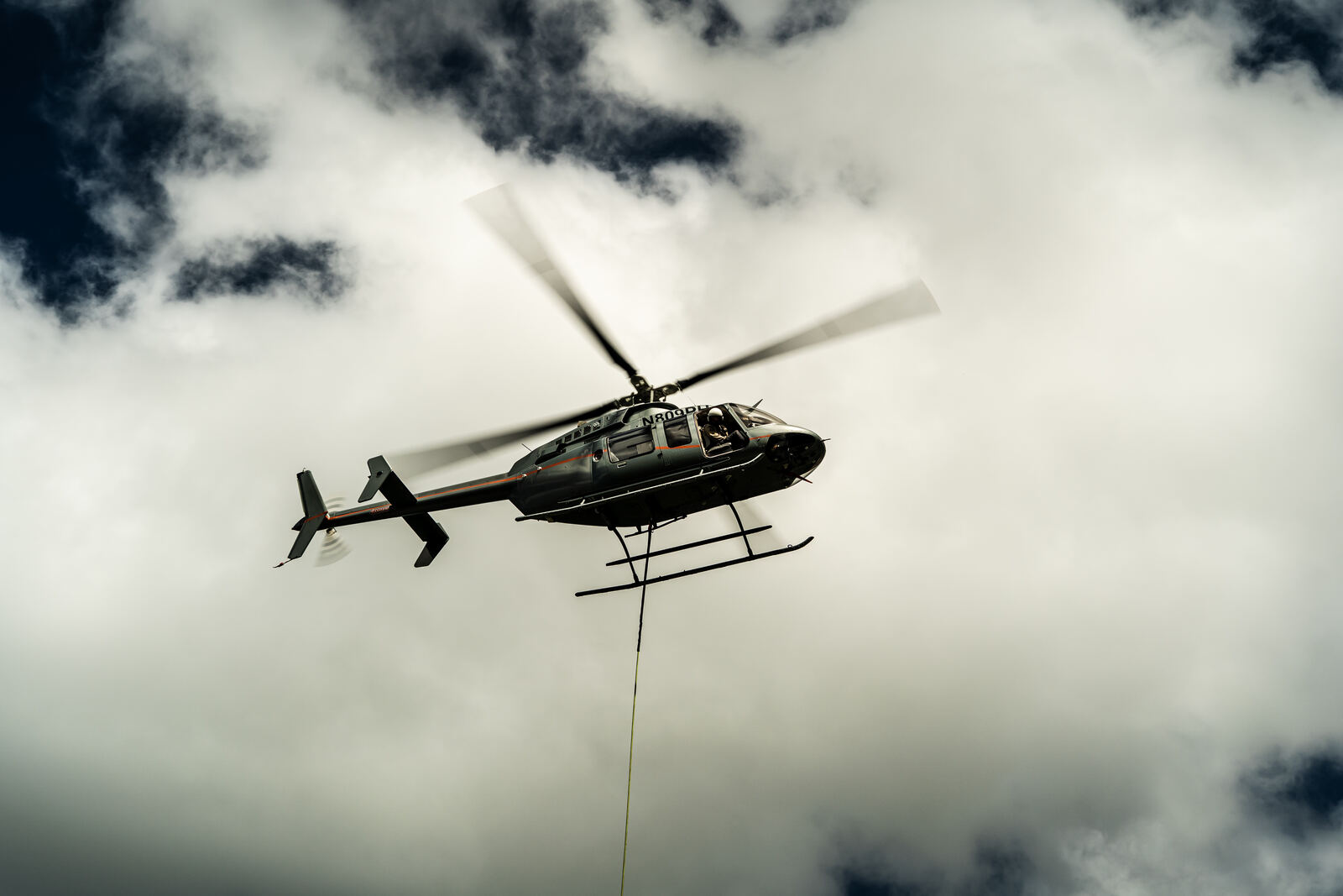 Helicopter in flight on a long line